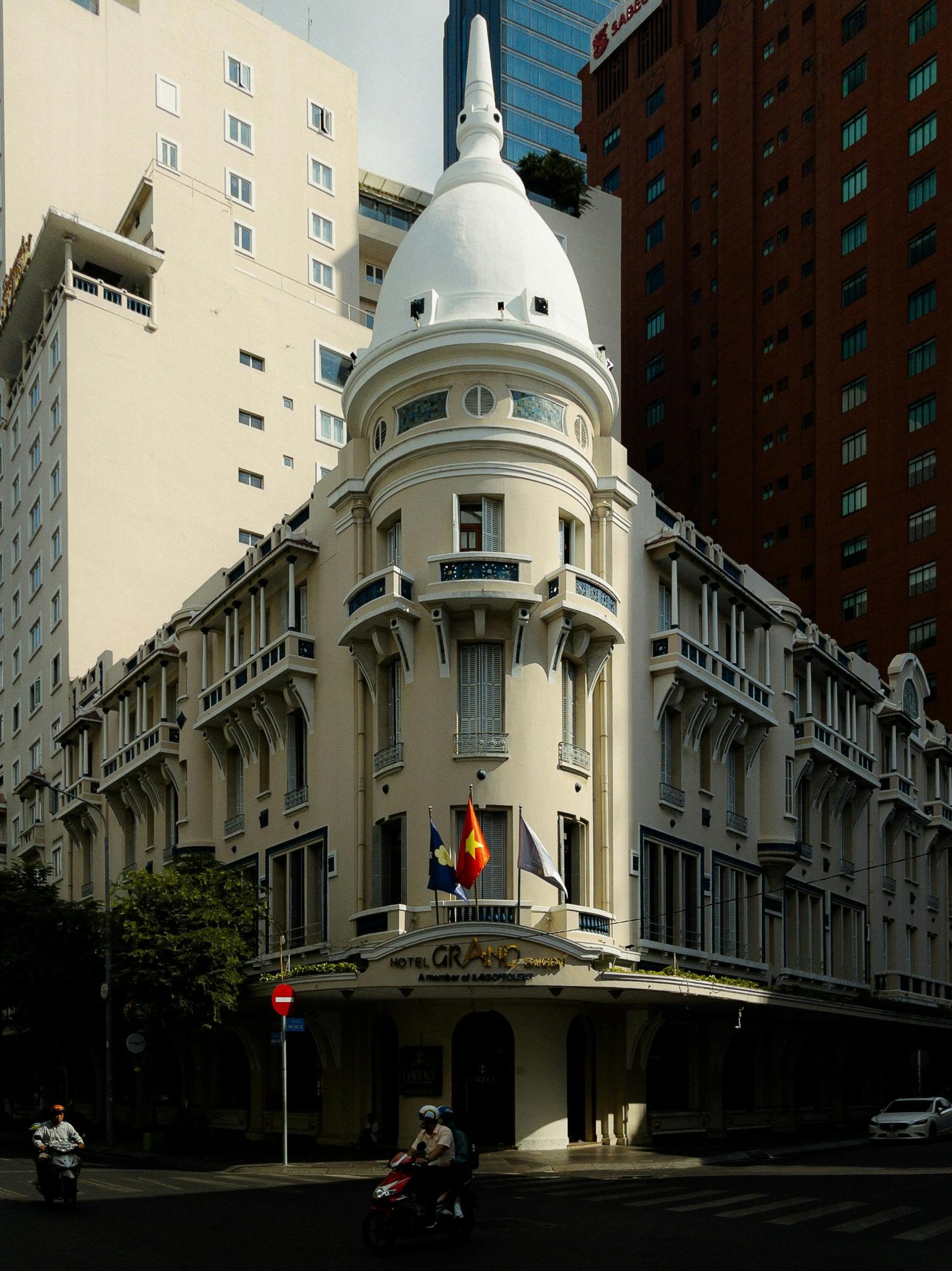 Elegant facade of the historic Grand Hotel Saigon in Ho Chi Minh City, showcasing classic colonial architecture.